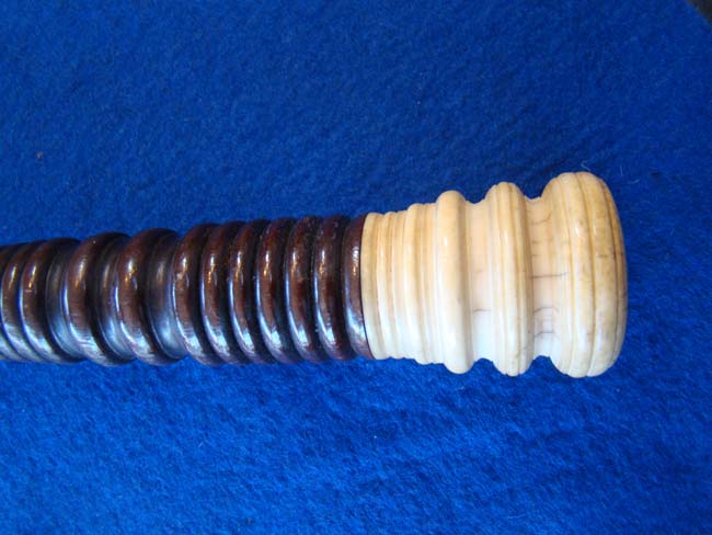 A 19th century whale ivory mounted walking stick inscribed "Jonathan Parker" with mahogany shaft circa 1850